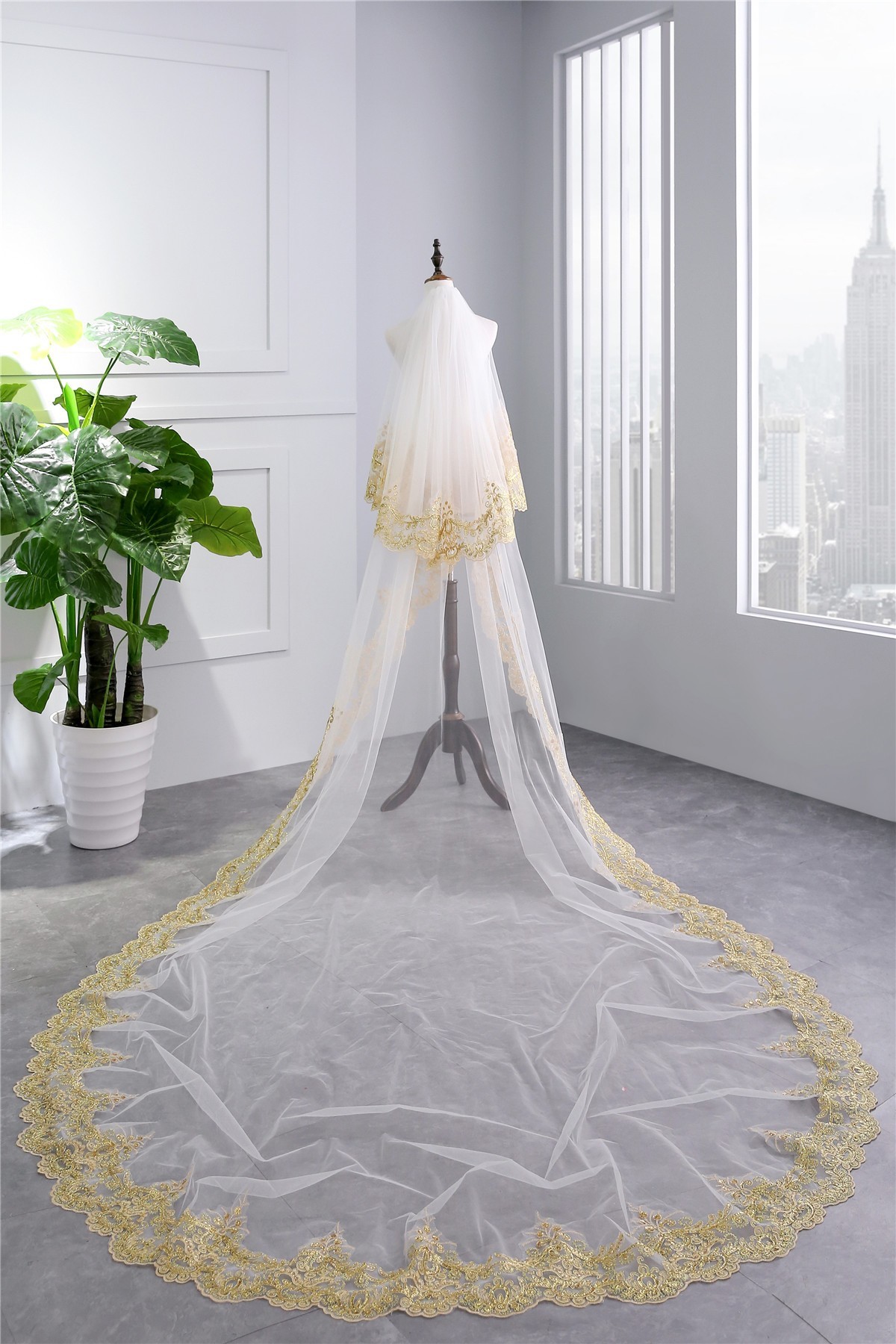 white and gold lace wedding dress