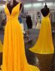 A Line Deep V Neck Backless Long Yellow Chiffon Pleated Prom Dress